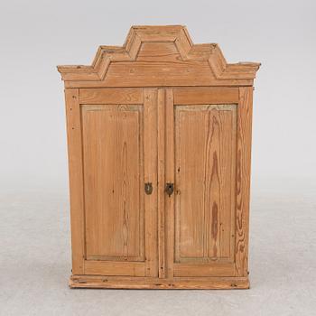 A first half of the 19th century cabinet.
