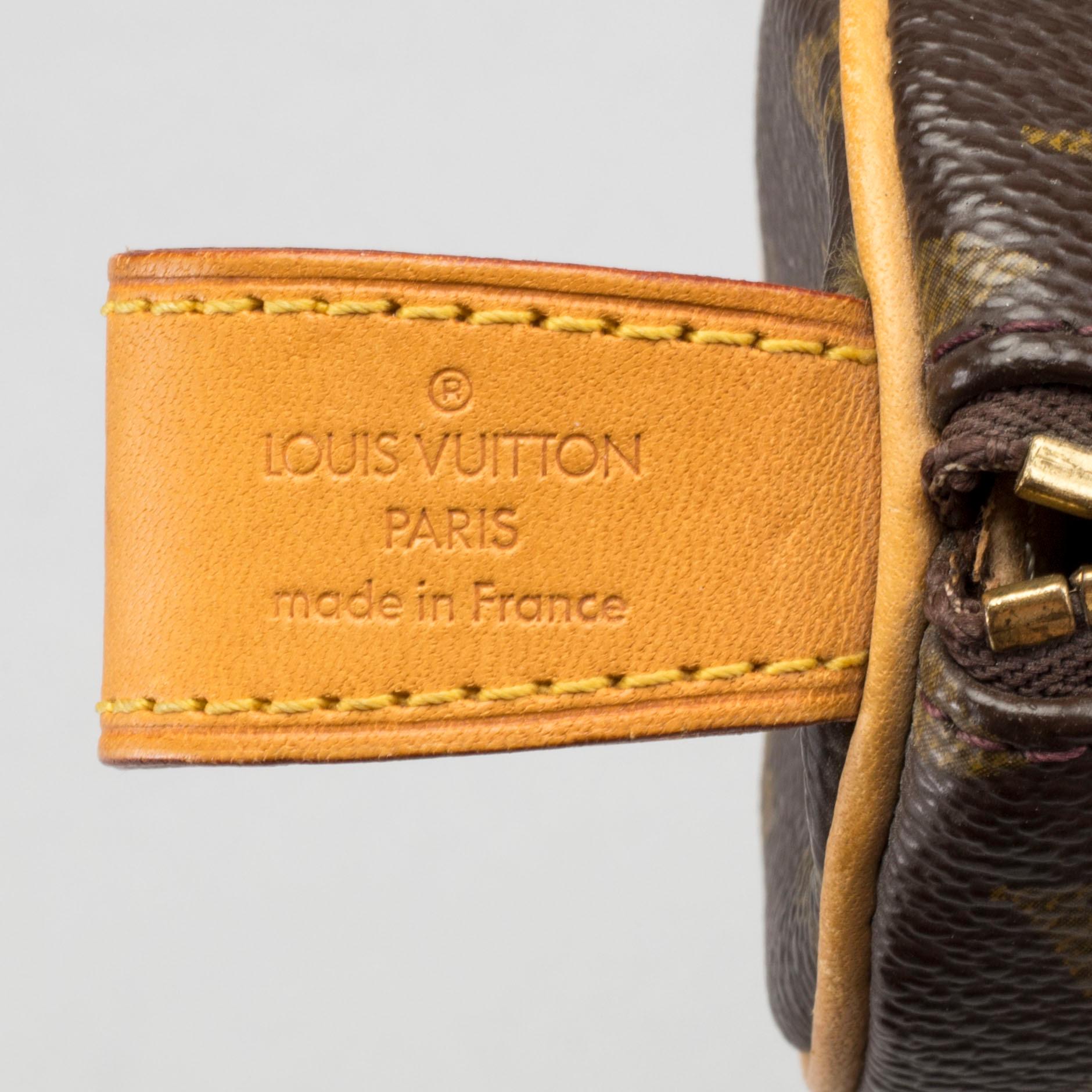 A LOUIS VUITTON TOILET POUCH and PENCIL CASE.