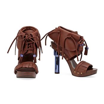 LOUIS VUITTON, a pair of brown leather platform sandalettes.