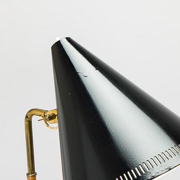Paavo Tynell, a pair of mid-20th century K10-10 floor lamps for Taito Finland.