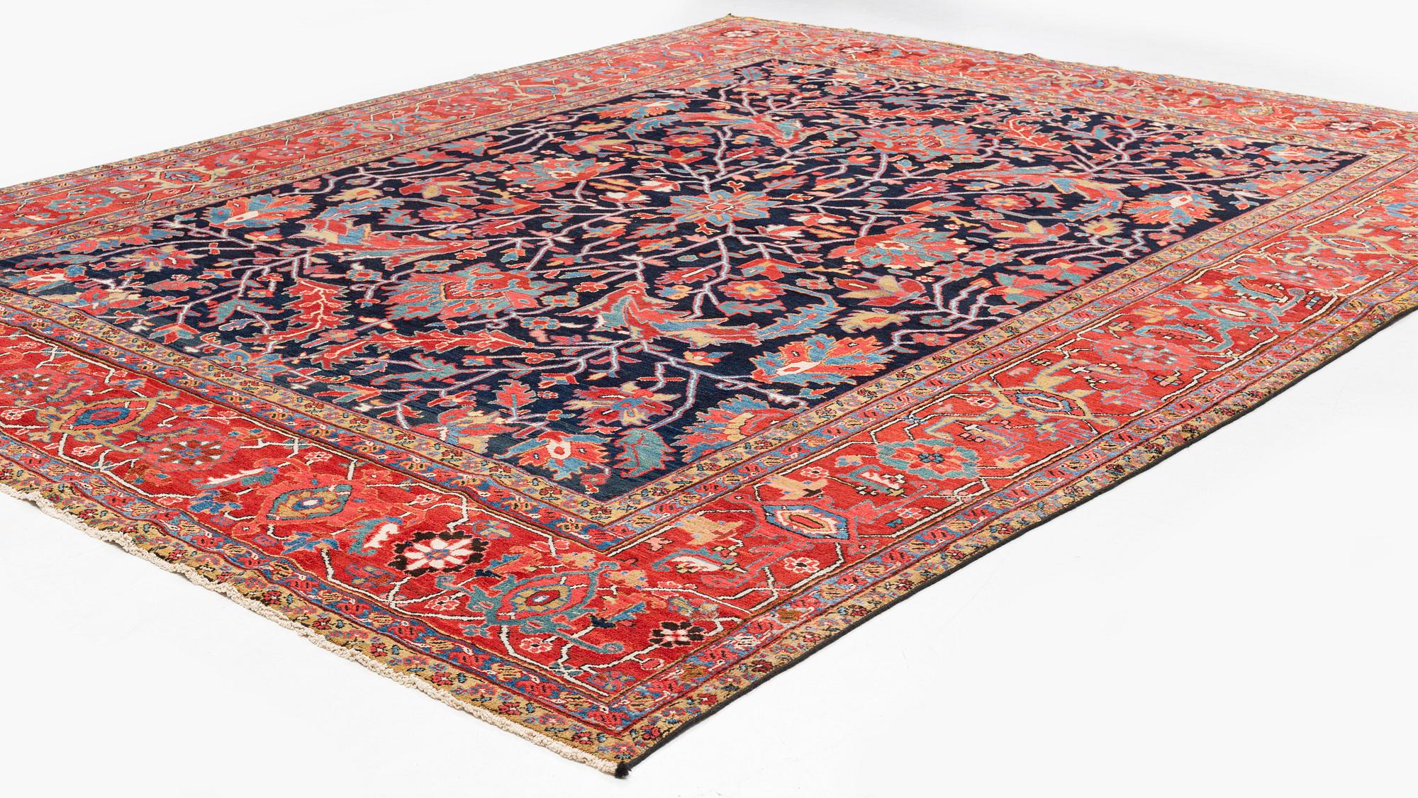 An antique Heriz Serapi, north west Persia, ca 421 x 352 cm.
