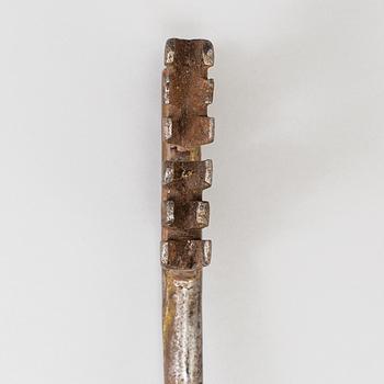 A metal key 17/18th century.