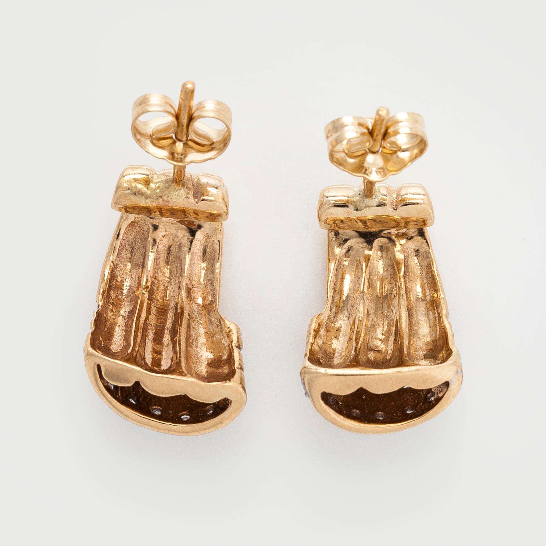 Korvakorut, 14K kultaa ja timantteja.