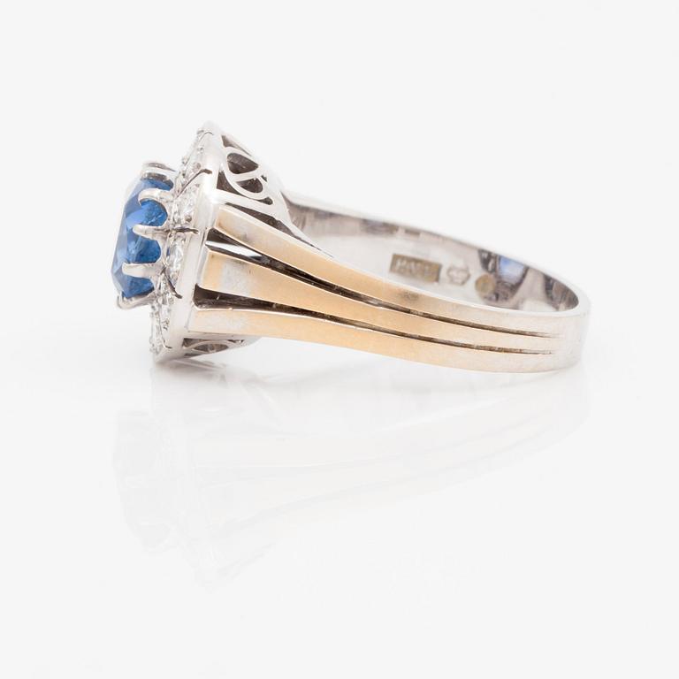 A 3.39 ct untreated sapphire and brilliant cut diamond ring. Total carat weight of diamonds 0.55 ct.