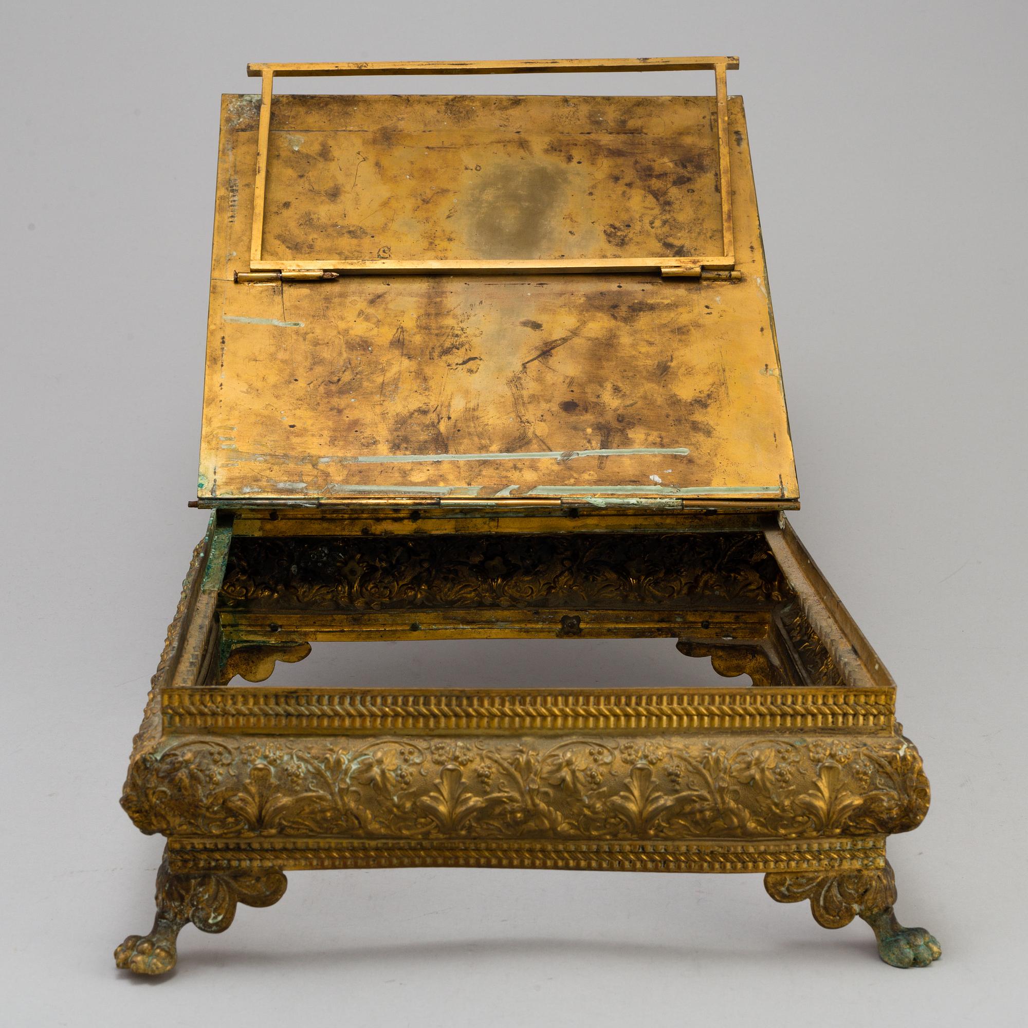 BOKSTÄLL, mässing, 1800-talets andra hälft.