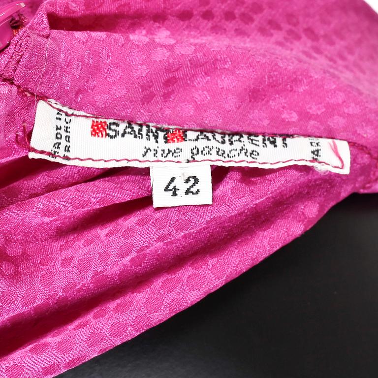 YVES SAINT LAURENT, two silk blouses.