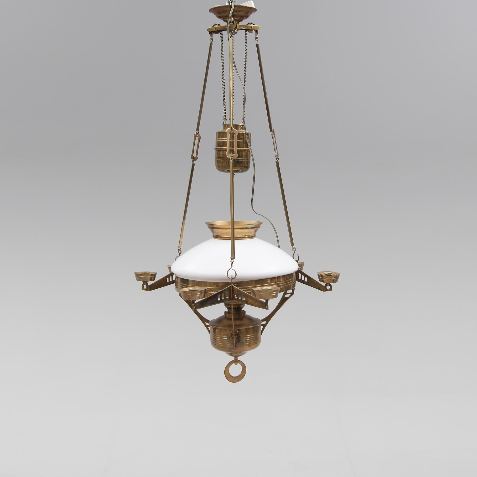 TAKFOTOGENLAMPA, 1900-talets början.