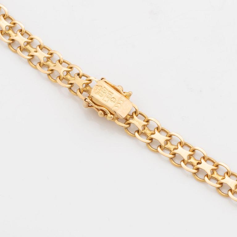 18K gold necklace.