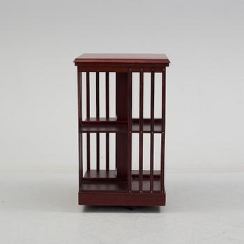 An second half of the 20th century turning book shelf veneered with mahogny.