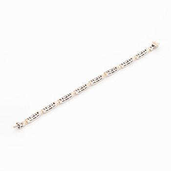 Rannekoru, 14K kultaa/valkokultaa prinsess- ja baguettehiottuja timantteja.