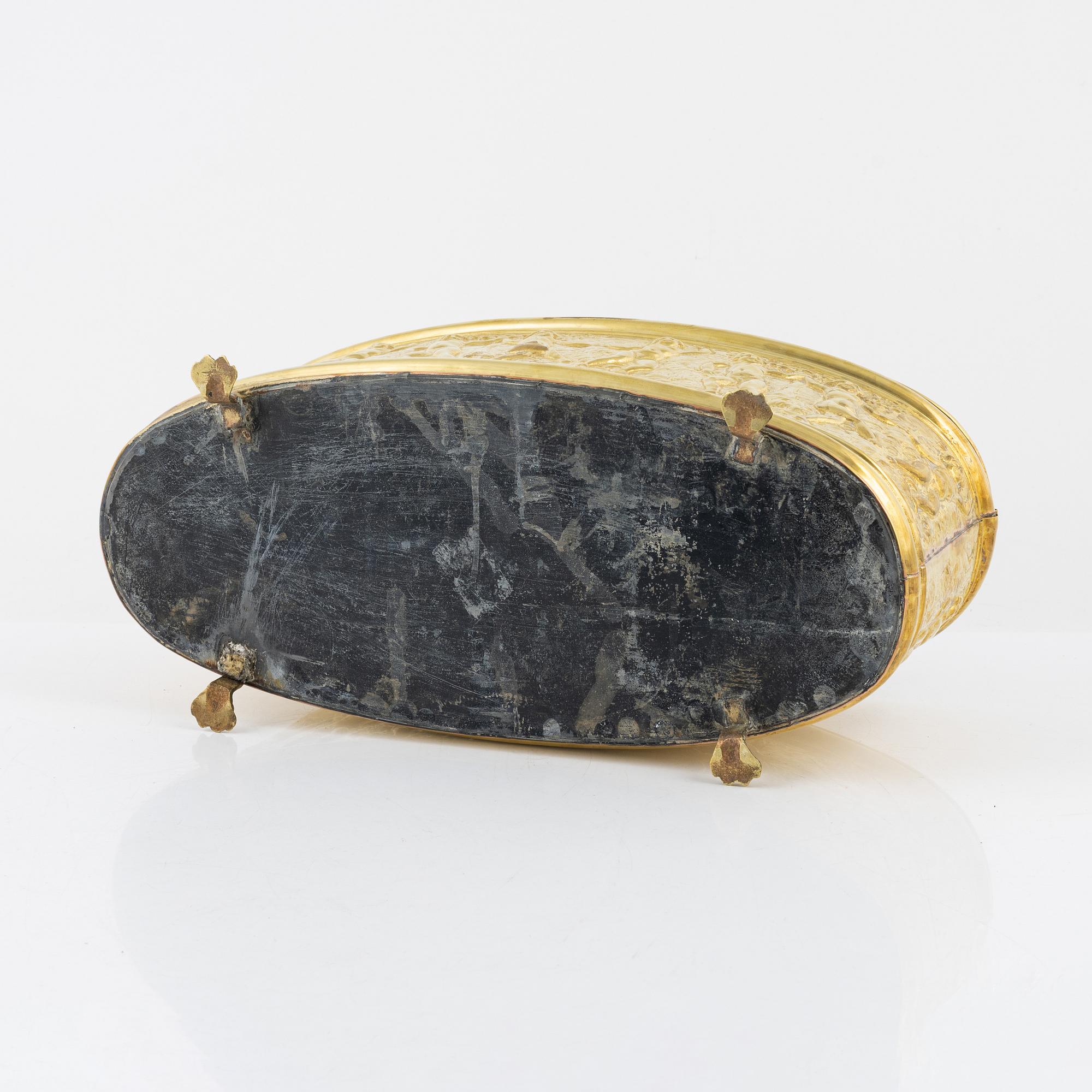 A brass jardiniere, circa 1900.