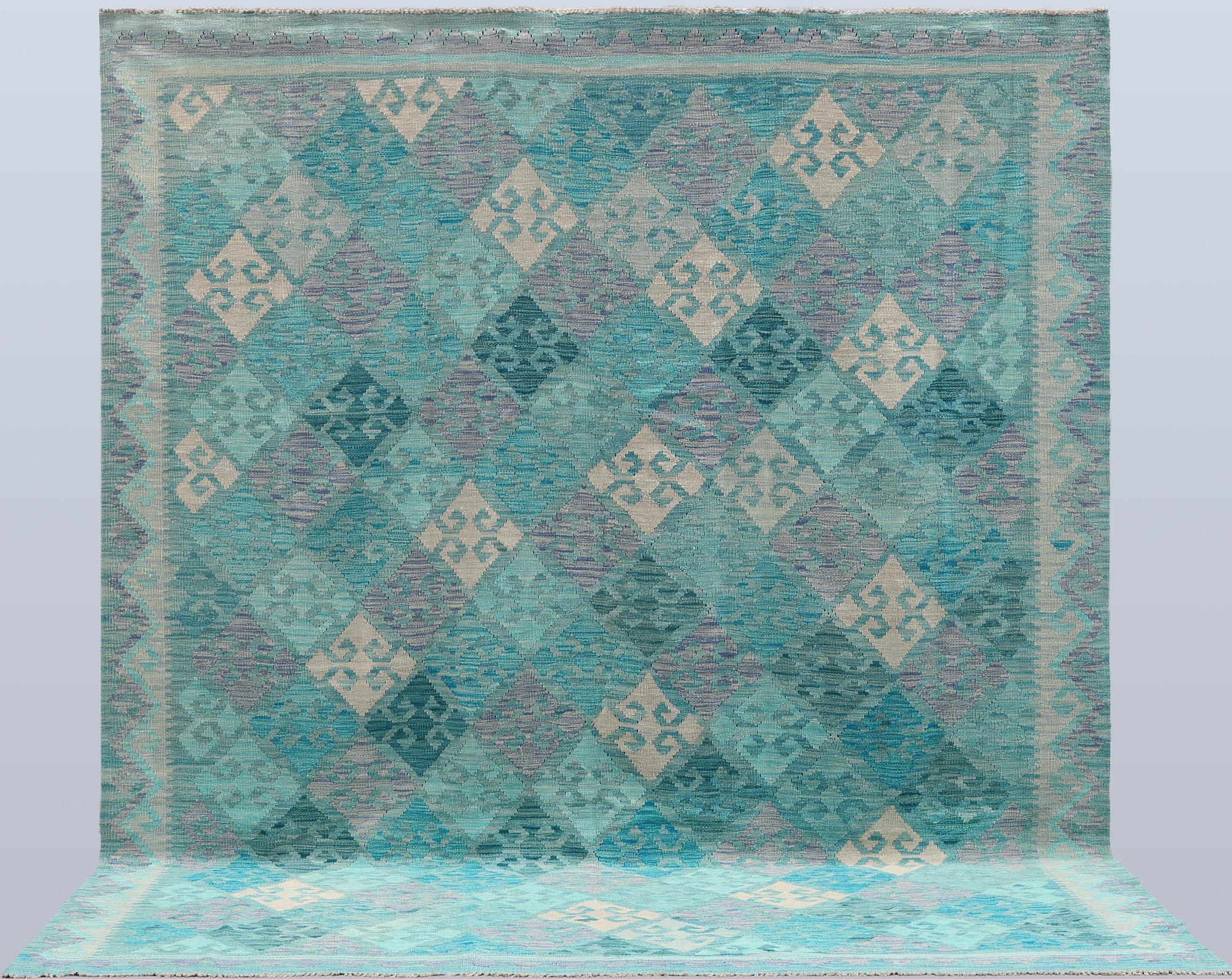 A Kelim carpet, c. 291 x 248 cm.