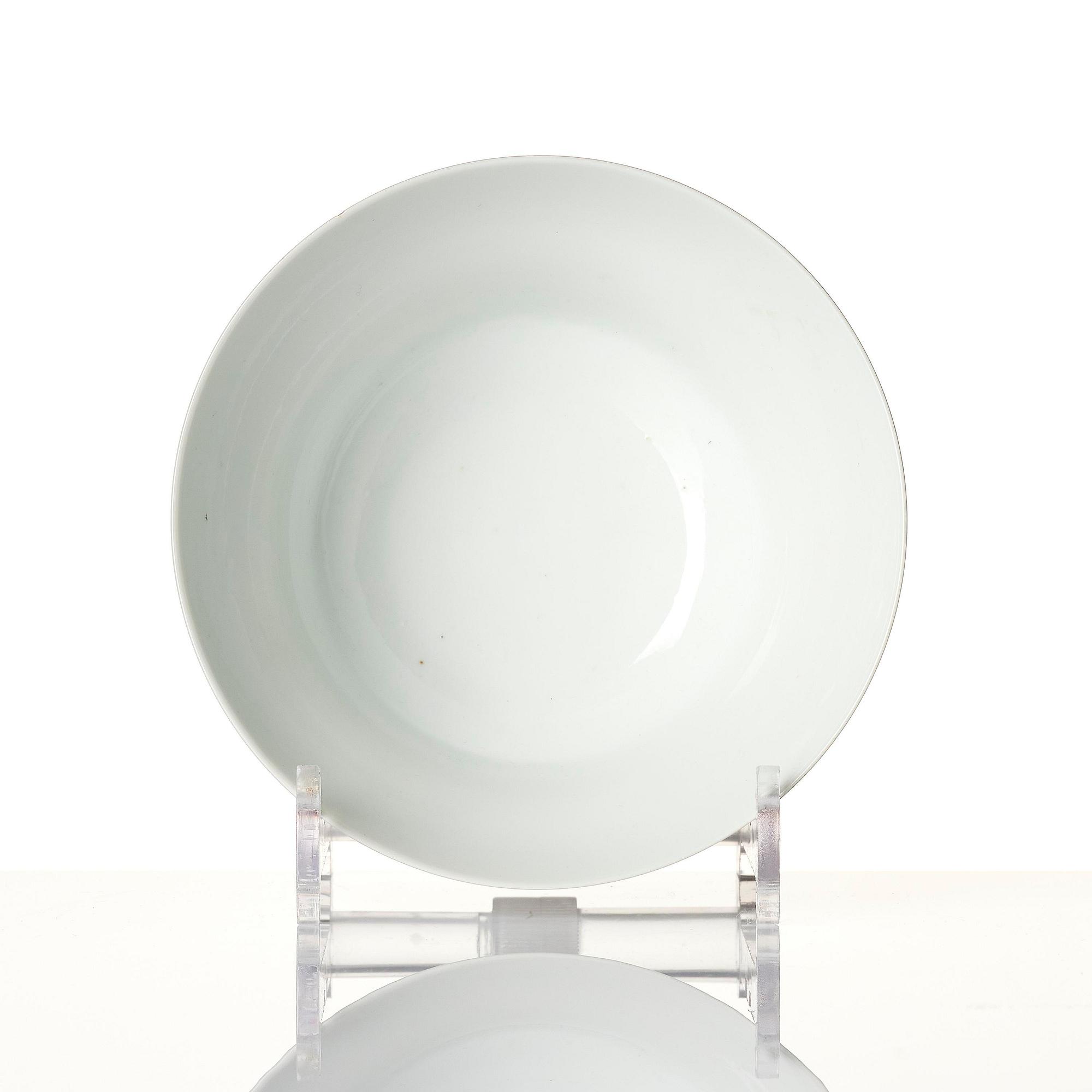 A fine famille rose ''prunus and magnolia' bowl, Qing dynasty.