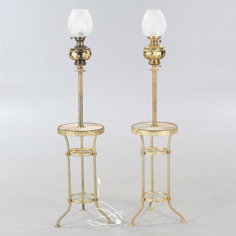 Two floor parafine lamps, 20th century.