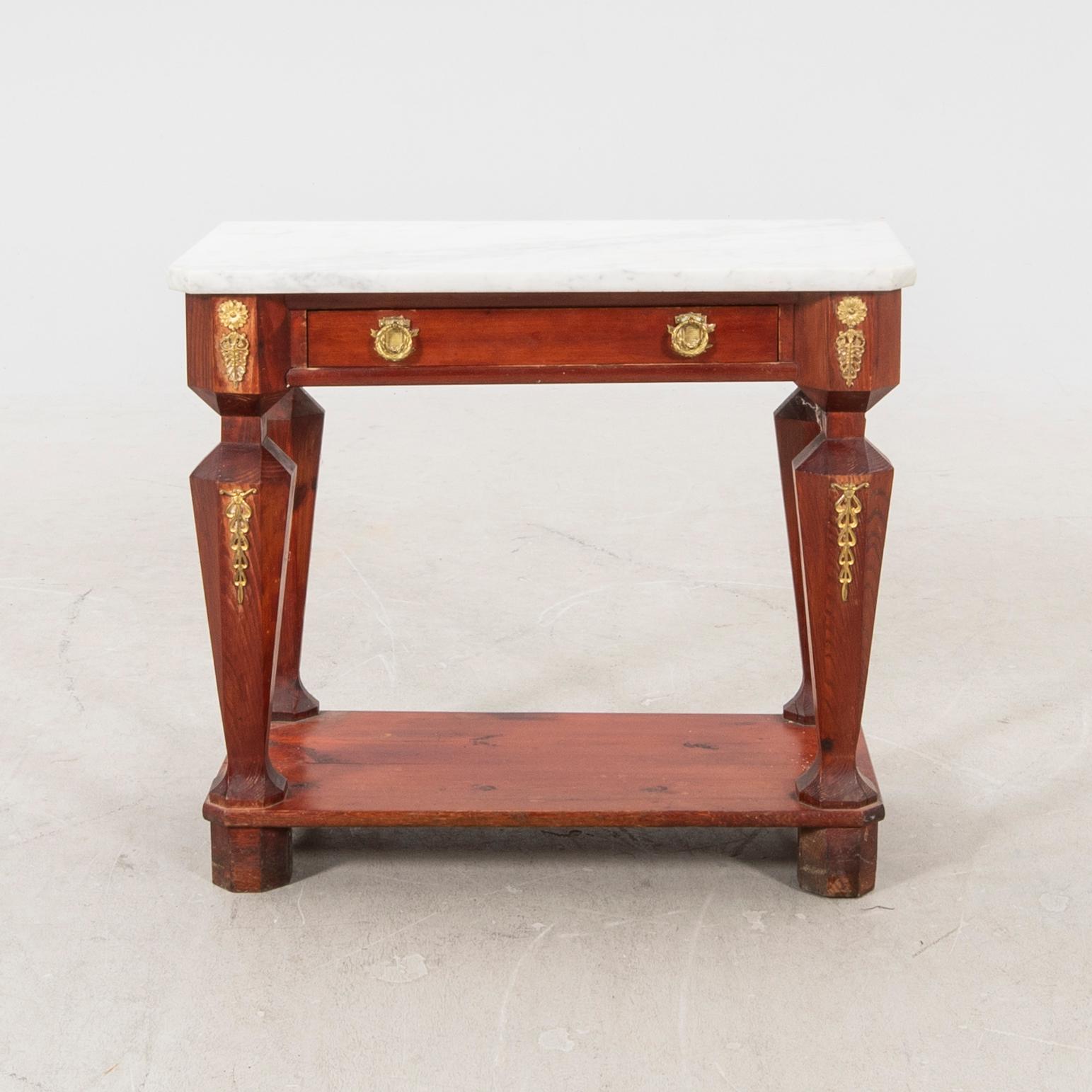 An empire style console table first half of the 20th century.