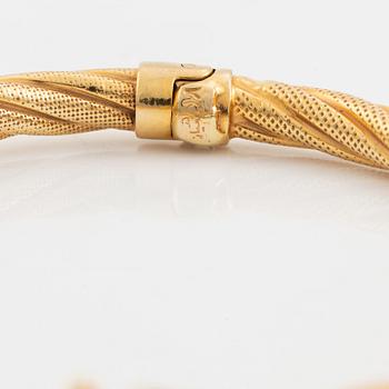 Armring, vriden dekor, guld.