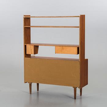 A BOOKSHELF WITH WRITING DESK, 1950/60's.