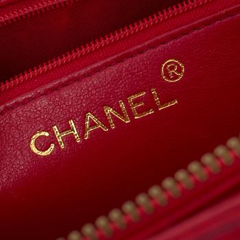Handbag by Chanel.