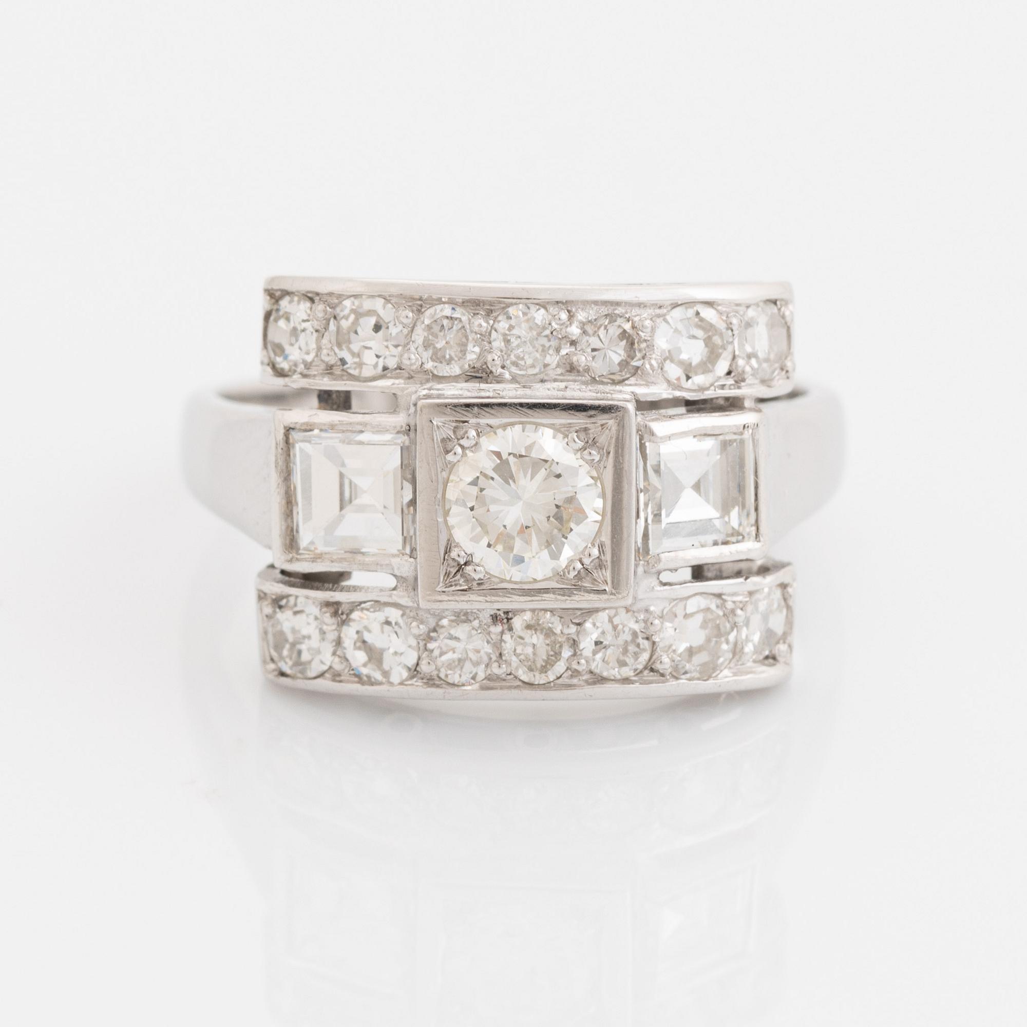 Brilliant-cut, old-cut brilliant and step-cut diamond ring.
