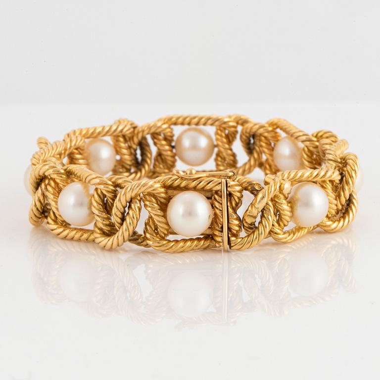 Armband 18K guld med odlade pärlor.