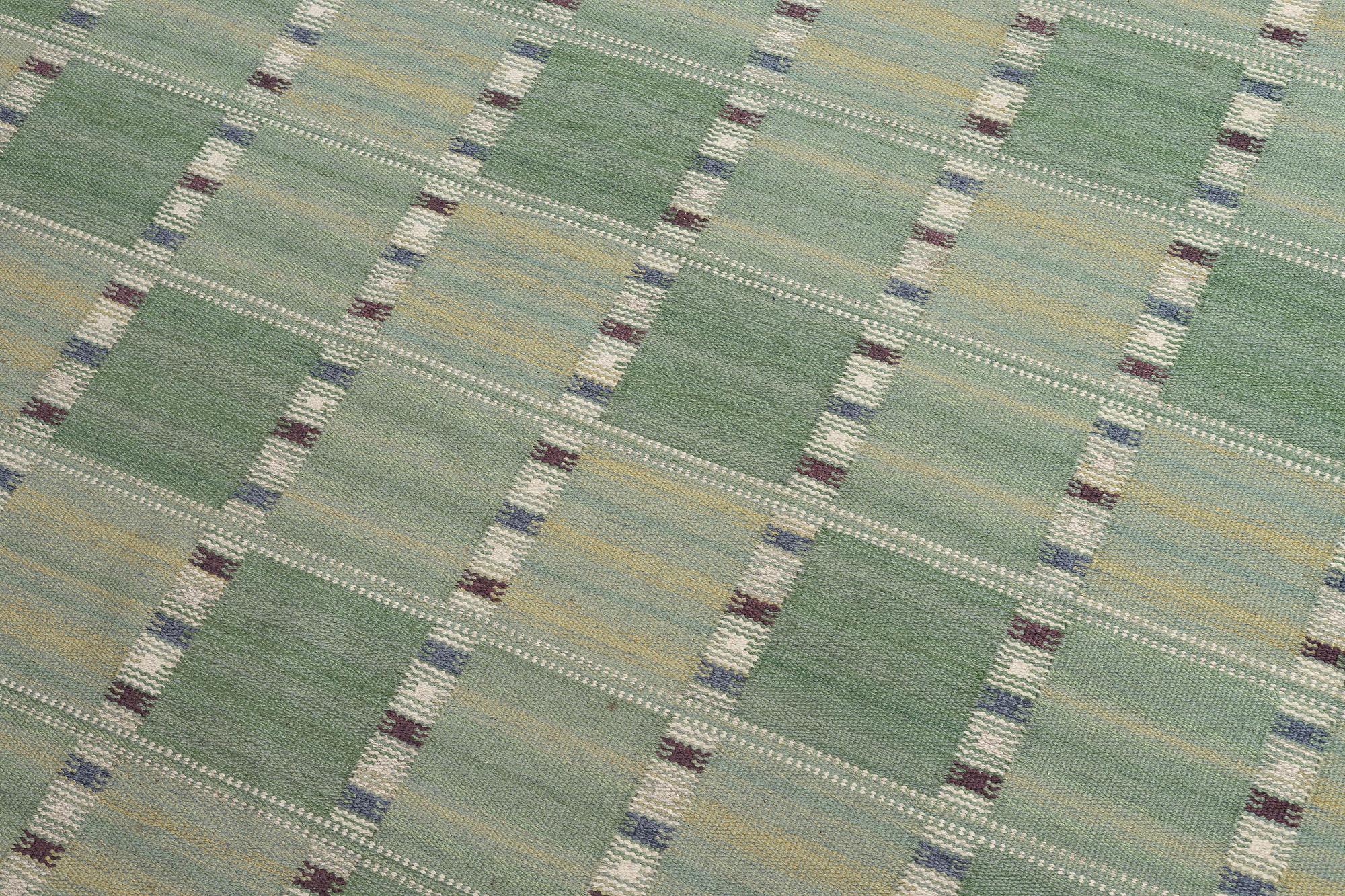 Barbro Nilsson, a carpet, 'Falurutan grön I', flat weave, c. 266 x 210 cm, signed AB MMF BN.