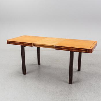 A birch dining table, 1930's.