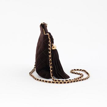 CHANEL, a brown suede cross body bag.