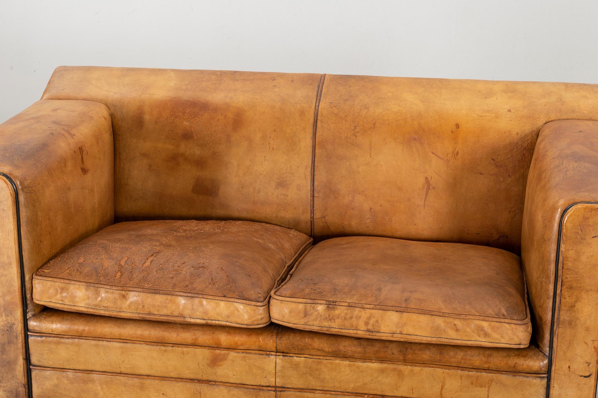 BART VAN BEKHOVEN, a second half of the 20th century leather sofa.