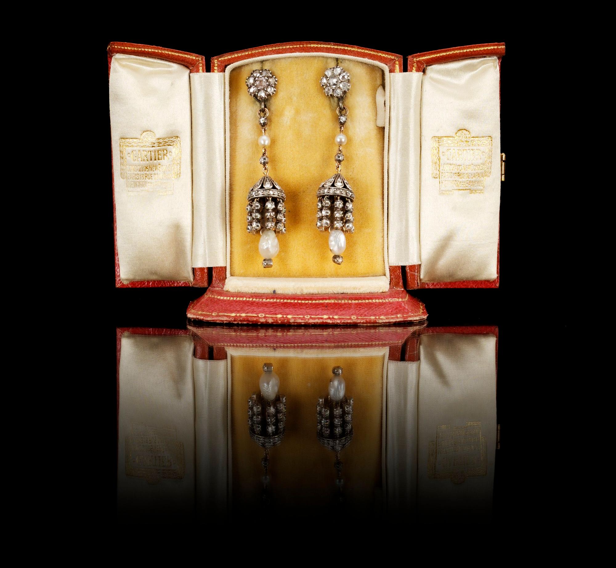 A pair of 19th cent silver, gold and rose cut diamond earrings.