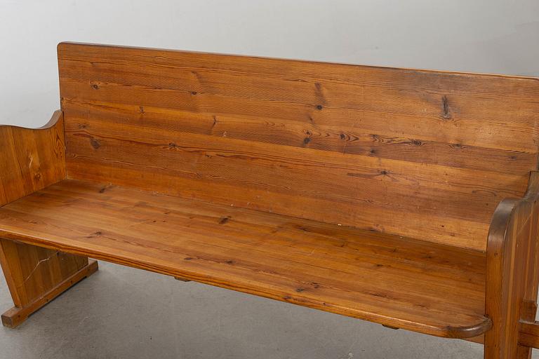 A 20th century Swedish stained pine sofa.