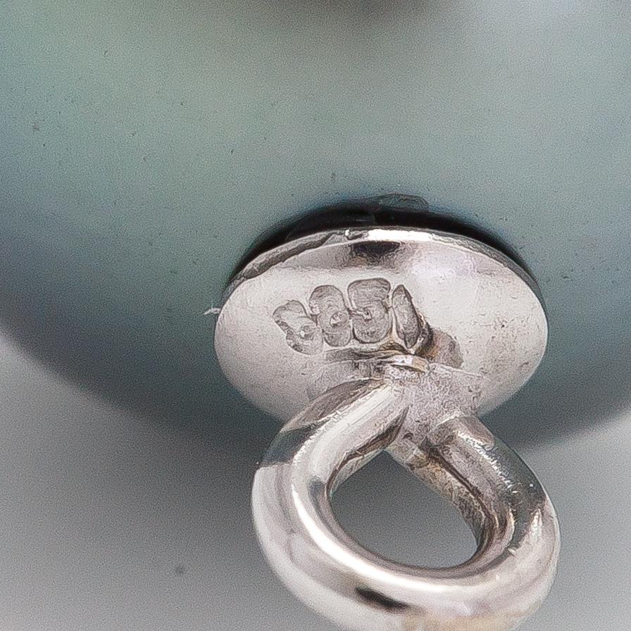 A 14K white gold an tahiti pearl pendant.
