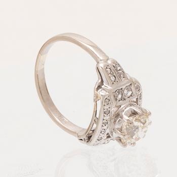 An 18K white gold ring set with an old cut diamond and rose cut diamonds.