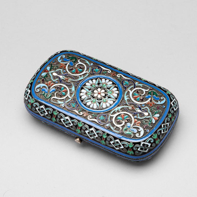 A Russian late 19th century silver-gilt and enamel cigarette-case, mark of Ovchinnikov, Moscow.