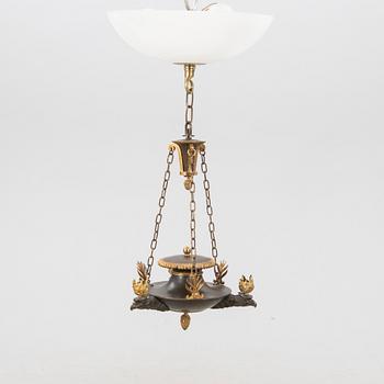 An Empire bronze chandelier.