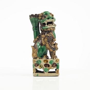 A Sancai glazed Buddhist lion incense/joss stick holder, Qing dynasty, Kangxi (1662-1722).