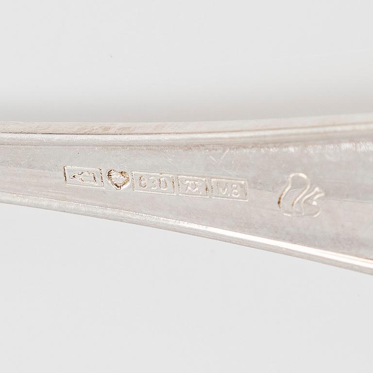 A 59-piece silver 'Chippendale' cutlery set, 20th century. Various Finnish manufacturers.