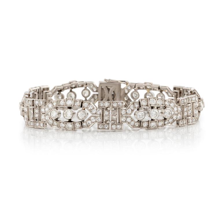 A platinum bracelet with round brilliant-and eight-cut diamonds.