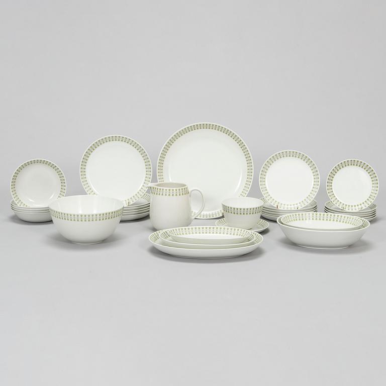 Raija Uosikkinen, A 32-piece set of 'Lily of the valley' faience dinnerware for Arabia 1960s.