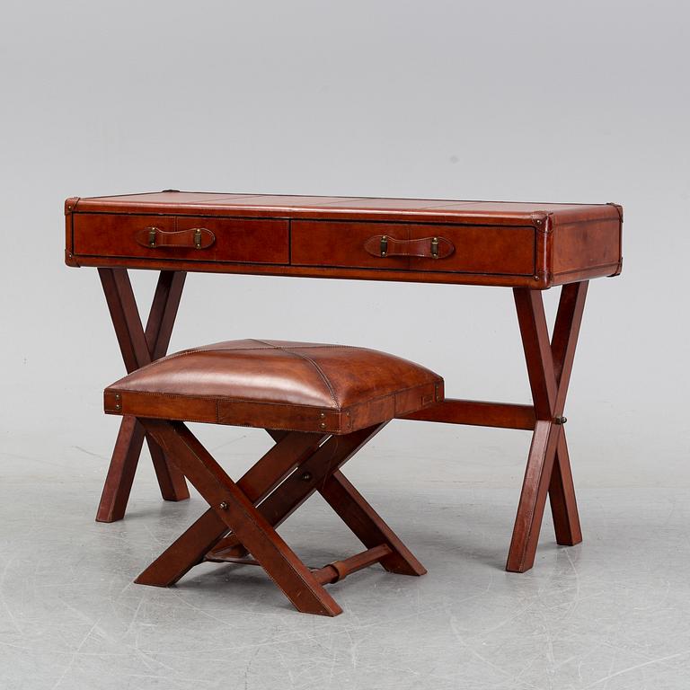 A contemporary dressing table with stool.