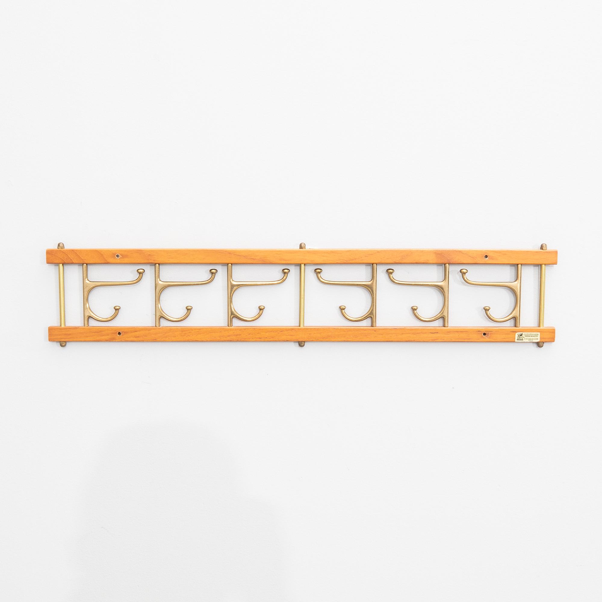 Klädhängare, "Dekorativ", Skoglunds metallgjuteri, Anderstorp, 1950/60-tal.