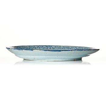 A large French faience dish, Rouen, 18th Century.