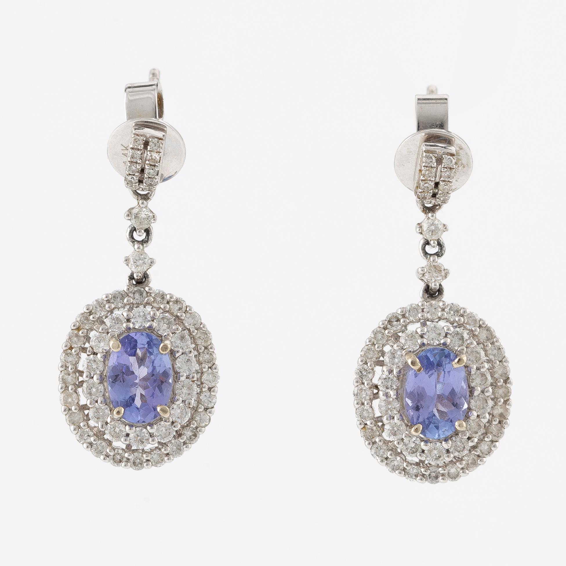 Earrings, 14K white gold with tanzanites and brilliant-cut diamonds.
