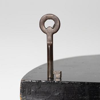 A small cabinet with drawers from around the year 1900.