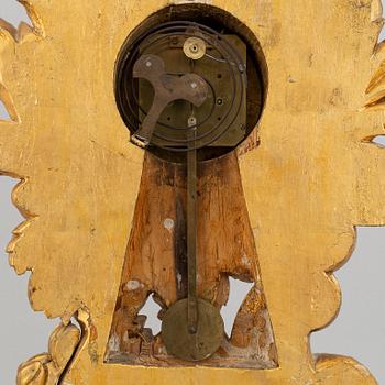 A rococo style table clock, 19th Century.