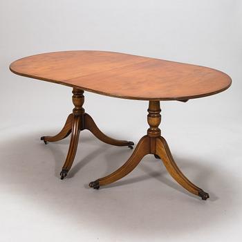 A 20th century English style dining table.