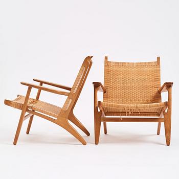 Hans J. Wegner, a pair of oak and rattan 'CH27' chairs, Carl Hansen & Søn, Odense Denmark 1950s-1960s.