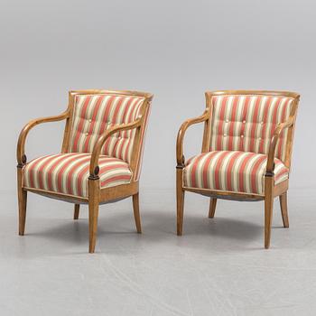 A pair of 1920s/1930s Swedish grace easy chairs.