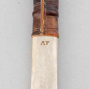 Anders Fankki, a Sami reindeer horn knife, signed AF.