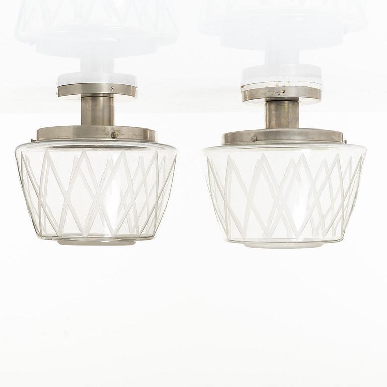 Harald Notini, taklampor, ett par, modell 11197, Arvid Böhlmarks Lampfabrik, Stockholm, 1940-tal.