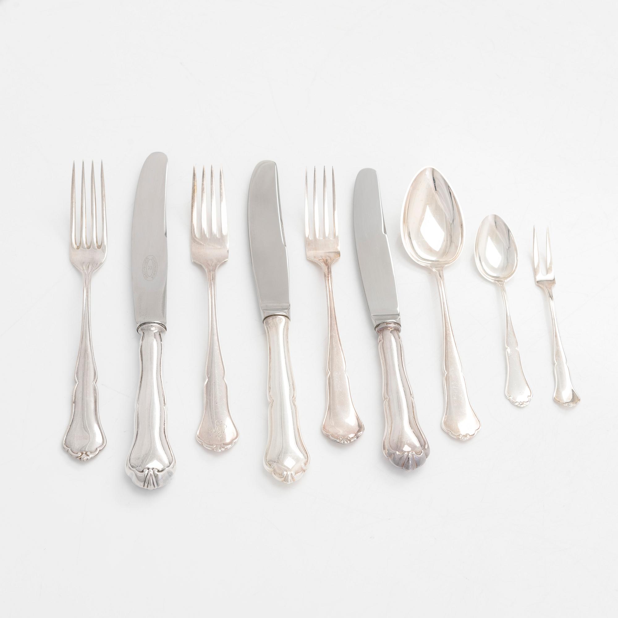 A 78-piece silver 'Chippendale' cutlery set, 1978-2007. Various Finnish manufacturers.
